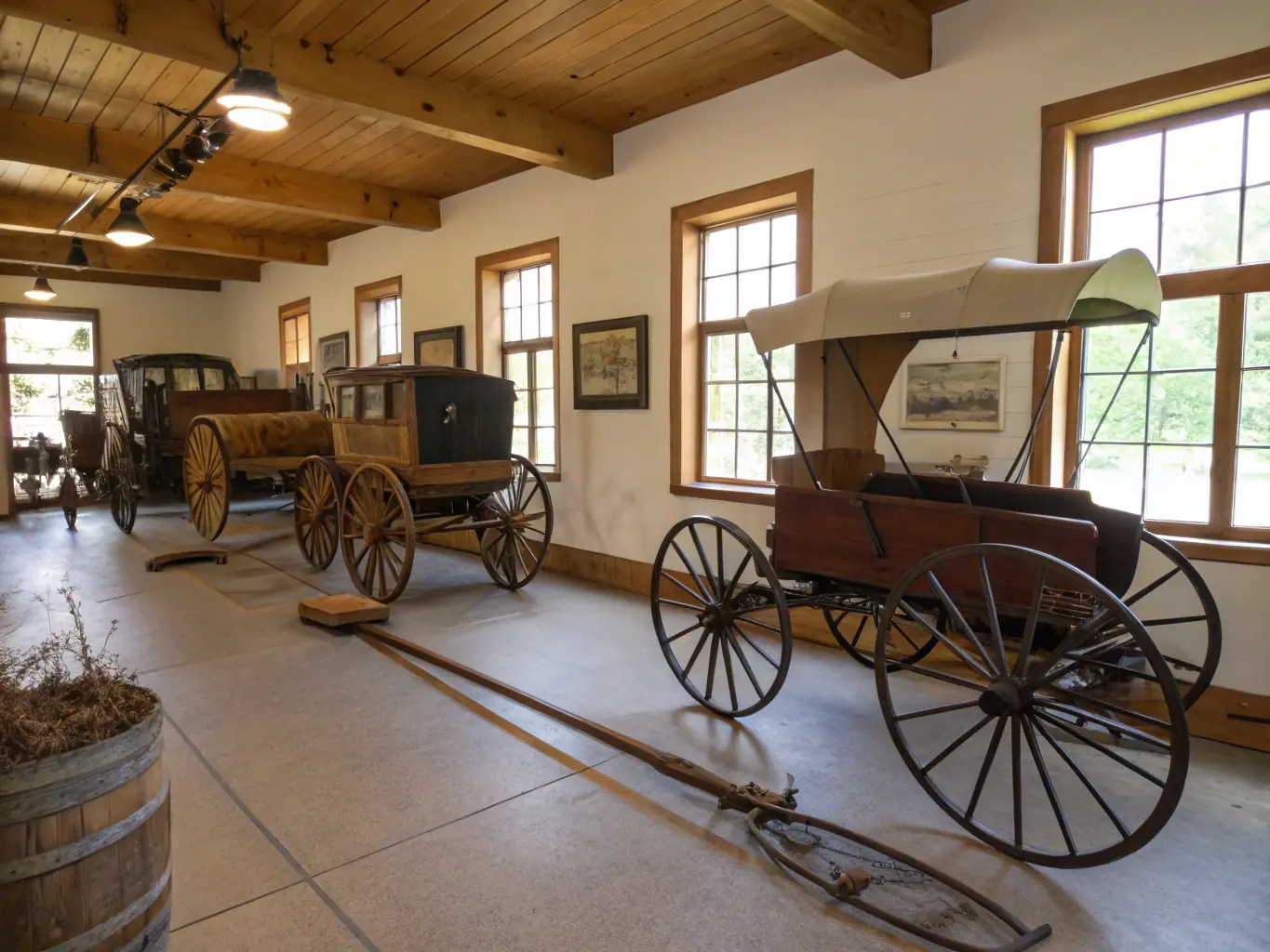 A photograph capturing the interior of the museum, showcasing a meticulously restored 19th-century tractor, with informational placards detailing its history and use in local agriculture. The scene is well-lit, emphasizing the craftsmanship of the machinery.